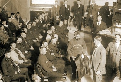 Rescued crew members from the Titanic being given dry clothes in New York City, 1912 by English Photographer